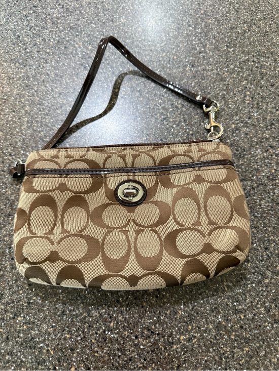 Coach Handbags - COACH Signature Monogram Brown Wristlet